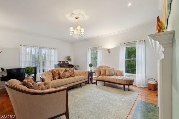 Chandelier, Fireplace, Interior, Living room, Piano, Wood Texture Flooring