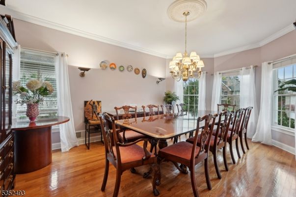 Chandelier, Dining room, Interior, Wood Texture Flooring