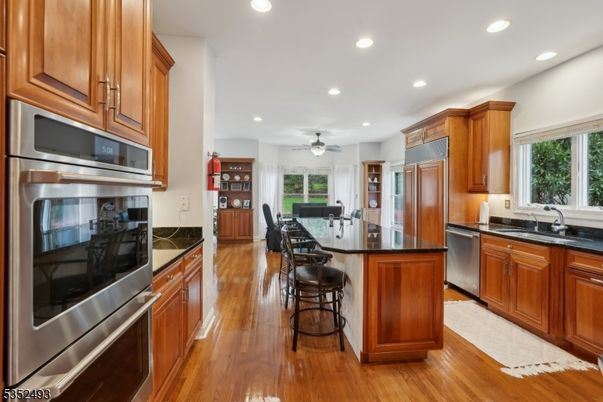 Dining room, Interior, Kitchen, Recessed Lighting, Stainless Steel Appliances, Wood Texture Flooring