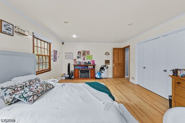 Bedroom, Fireplace, Interior, Recessed Lighting, Wood Texture Flooring