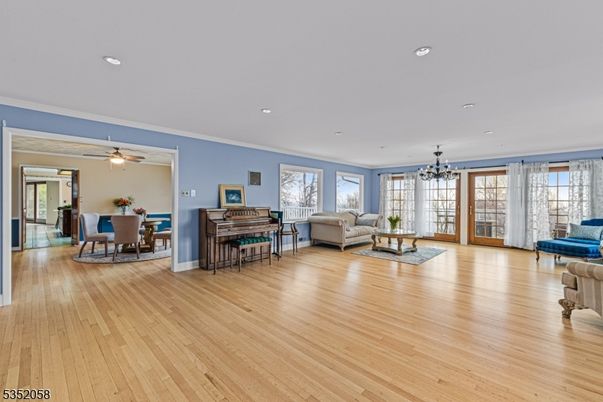 Dining room, Interior, Living room, Piano, Recessed Lighting, Wood Texture Flooring