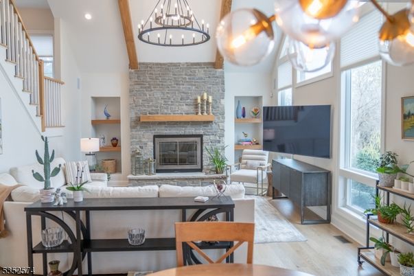 Fireplace, Interior, Living room, Pendant Lights, Recessed Lighting, Stone Walls, Wood Texture Flooring