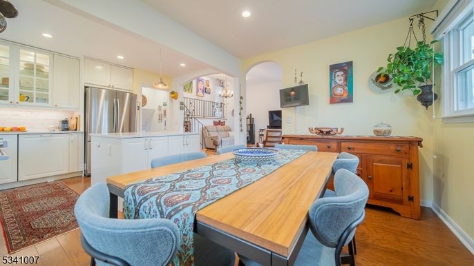 Dining room, Interior, Kitchen, Pendant Lights, Recessed Lighting, Stainless Steel Appliances, Wood Texture Flooring