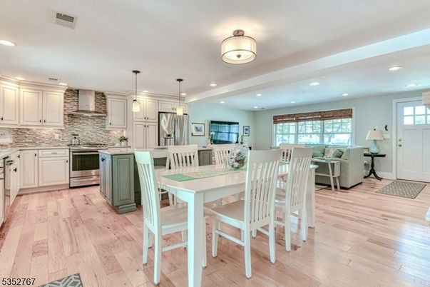 Dining room, Interior, Kitchen, Living room, Pendant Lights, Recessed Lighting, Stainless Steel Appliances, Wood Texture Flooring