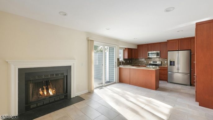 Fireplace, Interior, Kitchen, Recessed Lighting, Stainless Steel Appliances