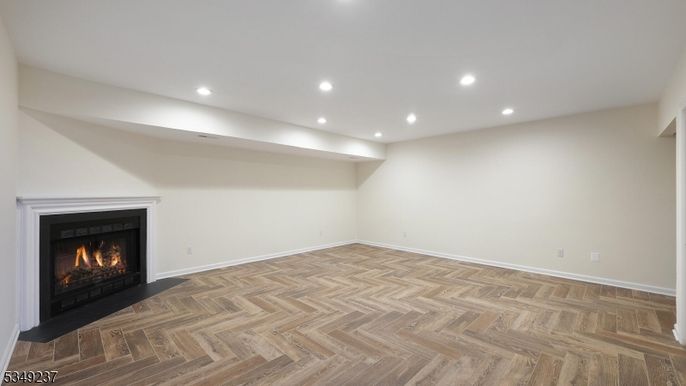 Empty room, Fireplace, Interior, Recessed Lighting, Wood Texture Flooring