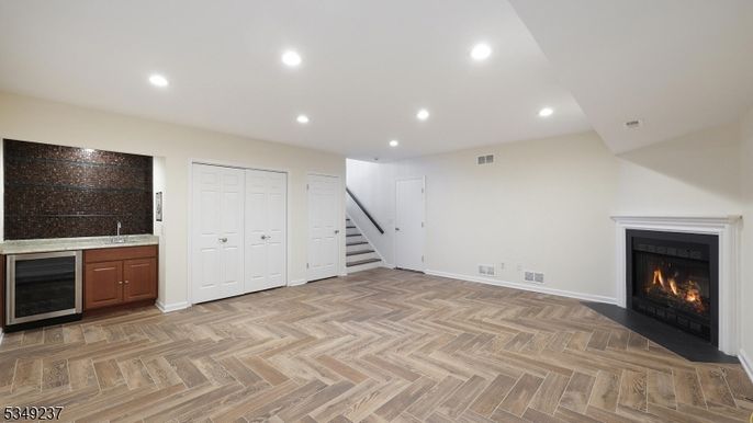Empty room, Fireplace, Interior, Recessed Lighting, Wood Texture Flooring