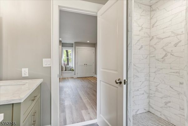 Bathroom, Interior, Marble Walls, Recessed Lighting, Wood Texture Flooring