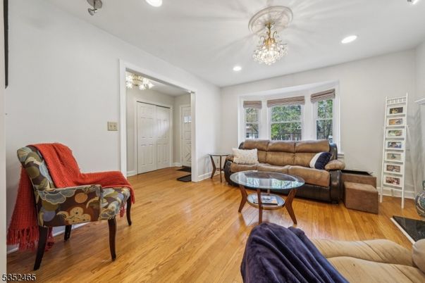 Chandelier, Interior, Living room, Recessed Lighting, Wood Texture Flooring