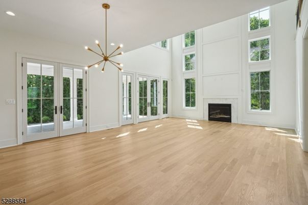 Empty room, Fireplace, Interior, Pendant Lights, Recessed Lighting, Wood Texture Flooring