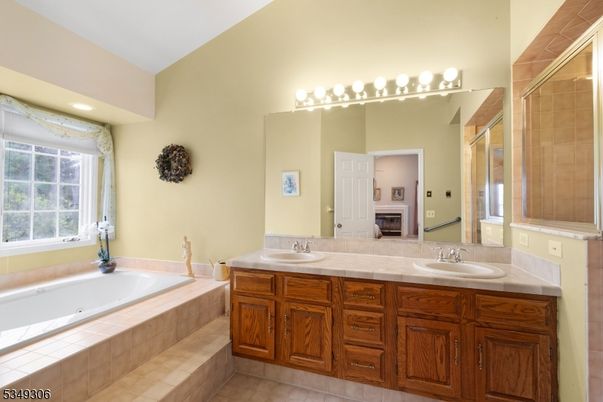 Bathroom, Dual Sink Vanities, Glass Shower, Interior, Recessed Lighting, Tile Countertops