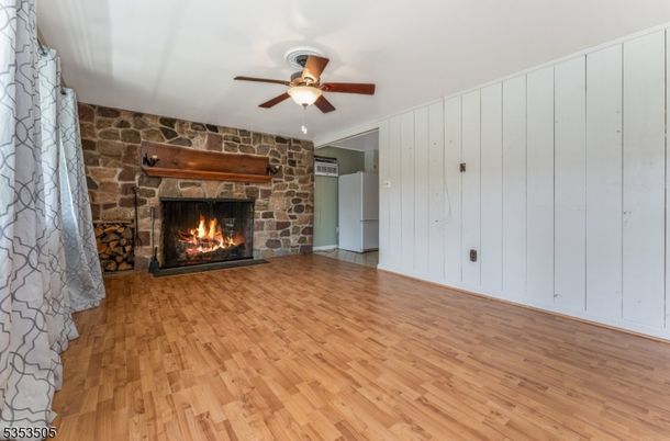 Empty room, Fireplace, Interior, Stone Walls, Wood Texture Flooring