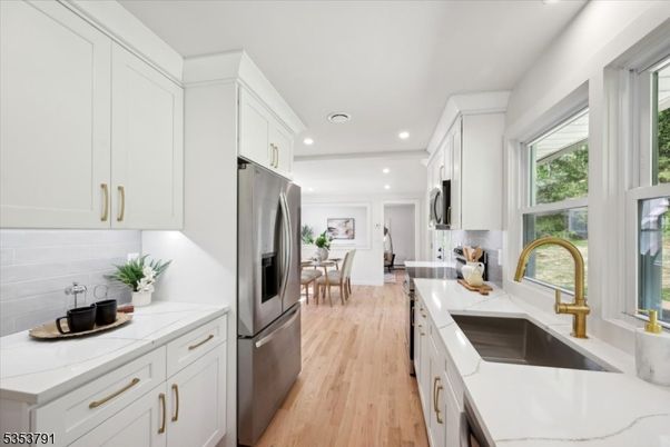 Dining room, Interior, Kitchen, Recessed Lighting, Stainless Steel Appliances, Wood Texture Flooring
