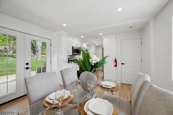 Dining room, Interior, Kitchen, Recessed Lighting, Stainless Steel Appliances, Wood Texture Flooring