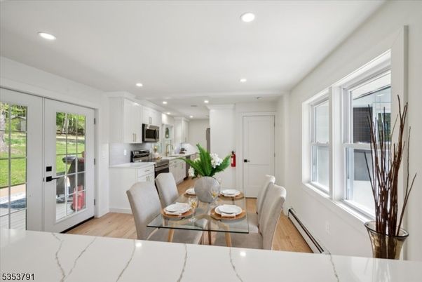 Dining room, Interior, Kitchen, Recessed Lighting, Stainless Steel Appliances, Wood Texture Flooring