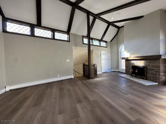Empty room, Fireplace, Interior, Recessed Lighting, Wooden Beams, Wood Texture Flooring