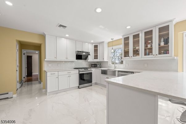 Interior, Kitchen, Marble, Pendant Lights, Recessed Lighting, Stainless Steel Appliances