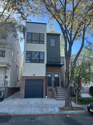 Attached, Exterior, Facade, Brick Facade, Modern