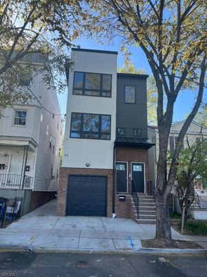 Attached, Exterior, Facade, Brick Facade, Modern