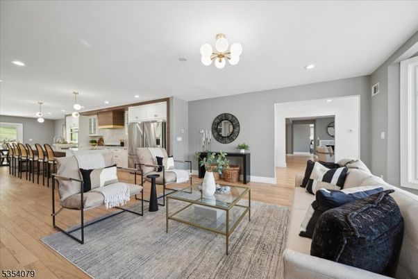 Dining room, Interior, Kitchen, Living room, Pendant Lights, Recessed Lighting, Stainless Steel Appliances, Wood Texture Flooring