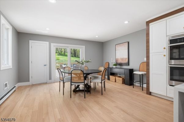 Dining room, Interior, Kitchen, Recessed Lighting, Stainless Steel Appliances, Wood Texture Flooring