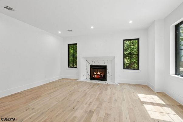 Empty room, Fireplace, Interior, Recessed Lighting, Wood Texture Flooring