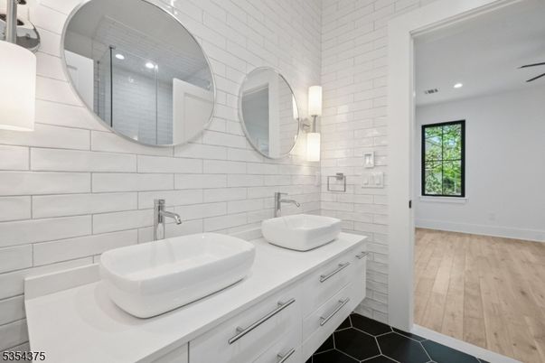 Bathroom, Dual Sink Vanities, Interior, Recessed Lighting, Wood Texture Flooring