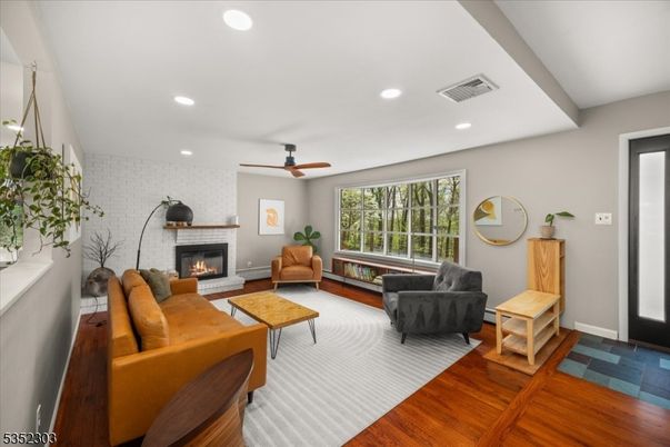 Fireplace, Interior, Living room, Recessed Lighting, Wood Texture Flooring