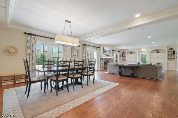 Chandelier, Dining room, Fireplace, Interior, Living room, Recessed Lighting, Wood Texture Flooring
