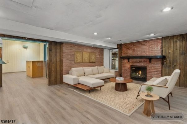 Fireplace, Interior, Living room, Recessed Lighting, Stone Walls, Wood Texture Flooring, Wooden Walls
