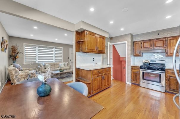Interior, Kitchen, Living room, Recessed Lighting, Stainless Steel Appliances, Wood Texture Flooring