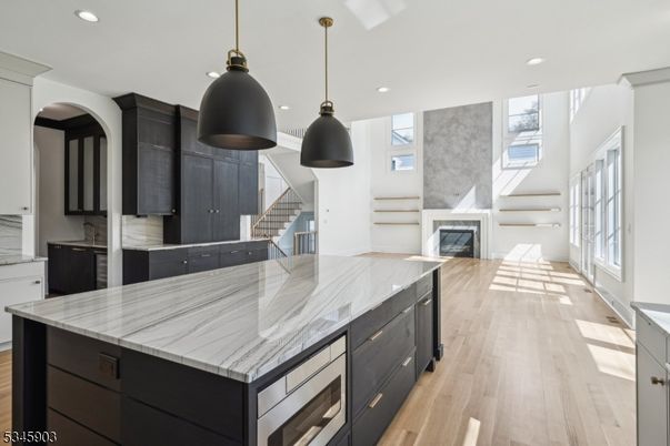 Fireplace, Interior, Kitchen, Pendant Lights, Recessed Lighting, Wood Texture Flooring