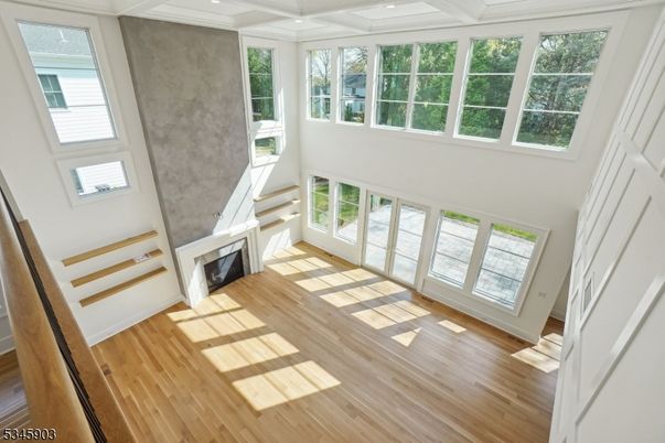 Empty room, Fireplace, Interior, Recessed Lighting, Wood Texture Flooring
