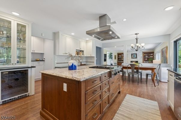 Chandelier, Dining room, Interior, Kitchen, Recessed Lighting, Stainless Steel Appliances, Wood Texture Flooring