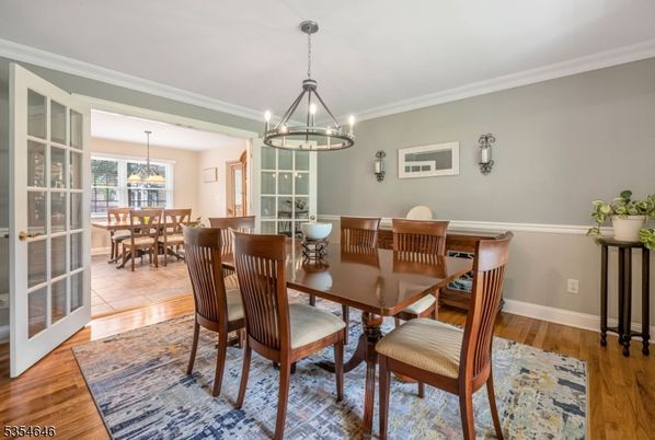 Chandelier, Dining room, Interior, Pendant Lights, Wood Texture Flooring