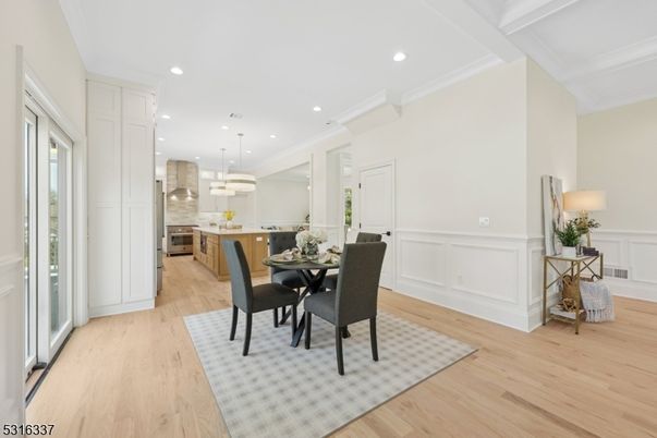 Dining room, Interior, Kitchen, Pendant Lights, Recessed Lighting, Stainless Steel Appliances, Wood Texture Flooring