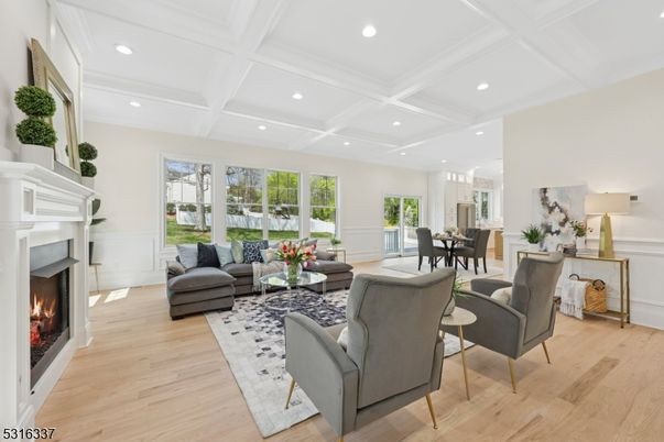Dining room, Fireplace, Interior, Living room, Recessed Lighting, Wood Texture Flooring