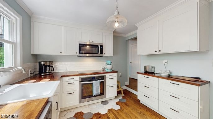 Interior, Kitchen, Pendant Lights, Stainless Steel Appliances, Wood Texture Flooring