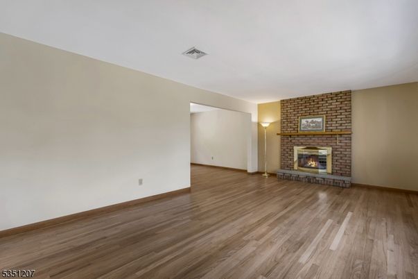 Empty room, Fireplace, Interior, Stone Walls, Wood Texture Flooring