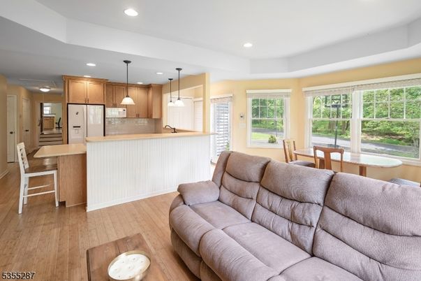 Dining room, Interior, Kitchen, Living room, Pendant Lights, Recessed Lighting, Stainless Steel Appliances, Wood Texture Flooring
