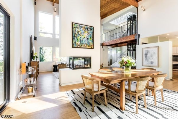 Dining room, Fireplace, Interior, Living room, Recessed Lighting, Wooden Beams, Wooden Ceilings, Wood Texture Flooring