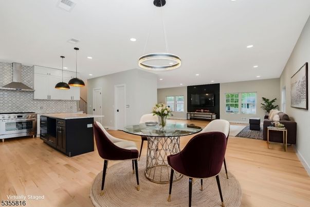 Dining room, Interior, Kitchen, Living room, Pendant Lights, Recessed Lighting, Stainless Steel Appliances, Wood Texture Flooring