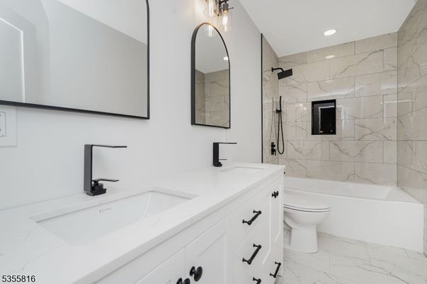 Bathroom, Dual Sink Vanities, Interior, Marble, Marble Walls, Recessed Lighting