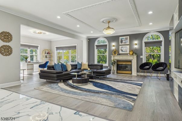 Fireplace, Interior, Living room, Marble, Recessed Lighting, Wood Texture Flooring