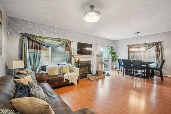 Dining room, Fireplace, Interior, Living room, Pendant Lights, Wood Texture Flooring