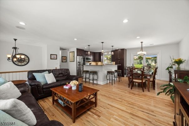 Dining room, Interior, Kitchen, Living room, Pendant Lights, Recessed Lighting, Stainless Steel Appliances, Wood Texture Flooring