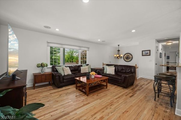 Chandelier, Interior, Living room, Recessed Lighting, Wood Texture Flooring