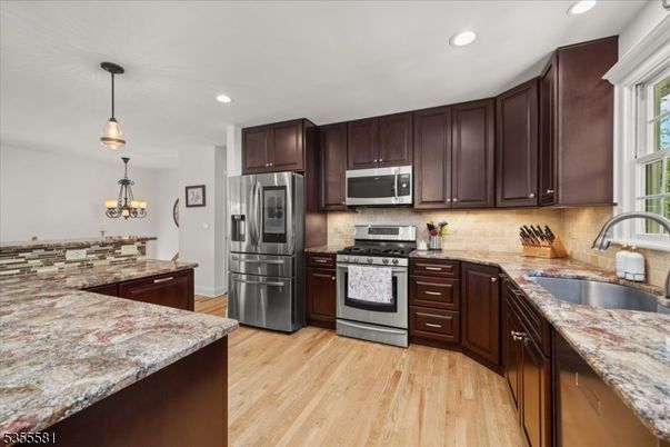 Chandelier, Interior, Kitchen, Pendant Lights, Recessed Lighting, Stainless Steel Appliances, Wood Texture Flooring