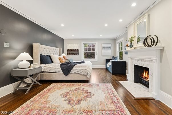 Bedroom, Fireplace, Interior, Recessed Lighting, Wood Texture Flooring