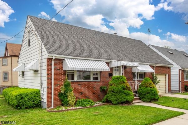 Attached, Exterior, Facade, Brick Facade, Cape Cod